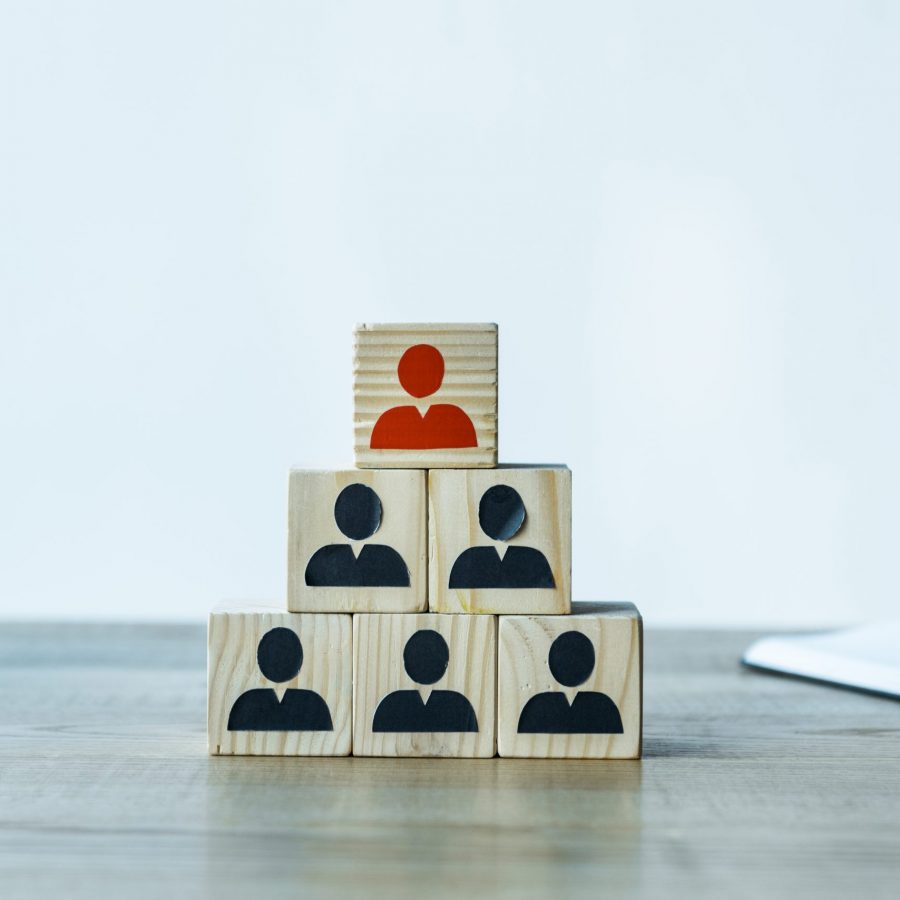 wooden cubes as human resources strategy near stationery on desk